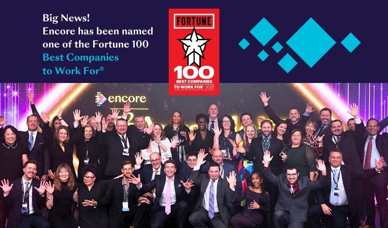 A large group of smiling Encore employees celebrate on stage, raising their hands. The image includes text announcing Encore’s recognition as a Fortune 100 Best Companies to Work For®, with the Fortune award logo.