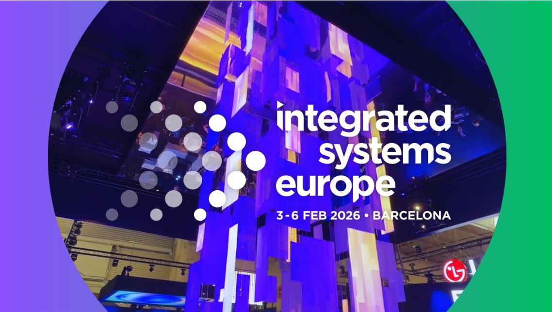 A colorful, modern installation with screens and lights at an exhibition. Overlaid text reads: integrated systems europe, 3-6 Feb 2026, Barcelona. A red illuminated logo is visible in the bottom right corner.
