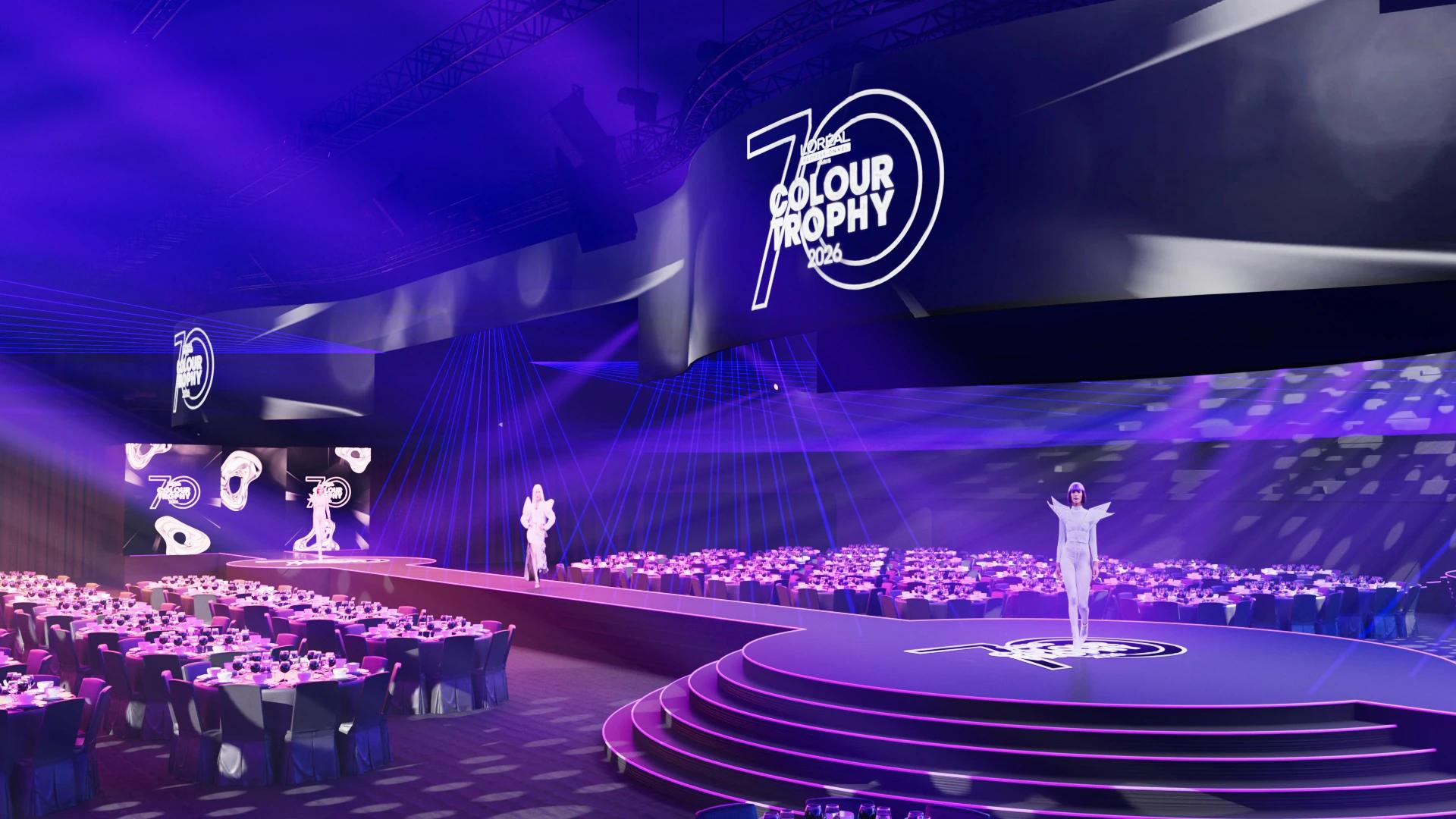 Elevated view of L’Oréal Colour Trophy stage, suspended LED displays, runway and banquet seating at O2 arena - Encore APAC