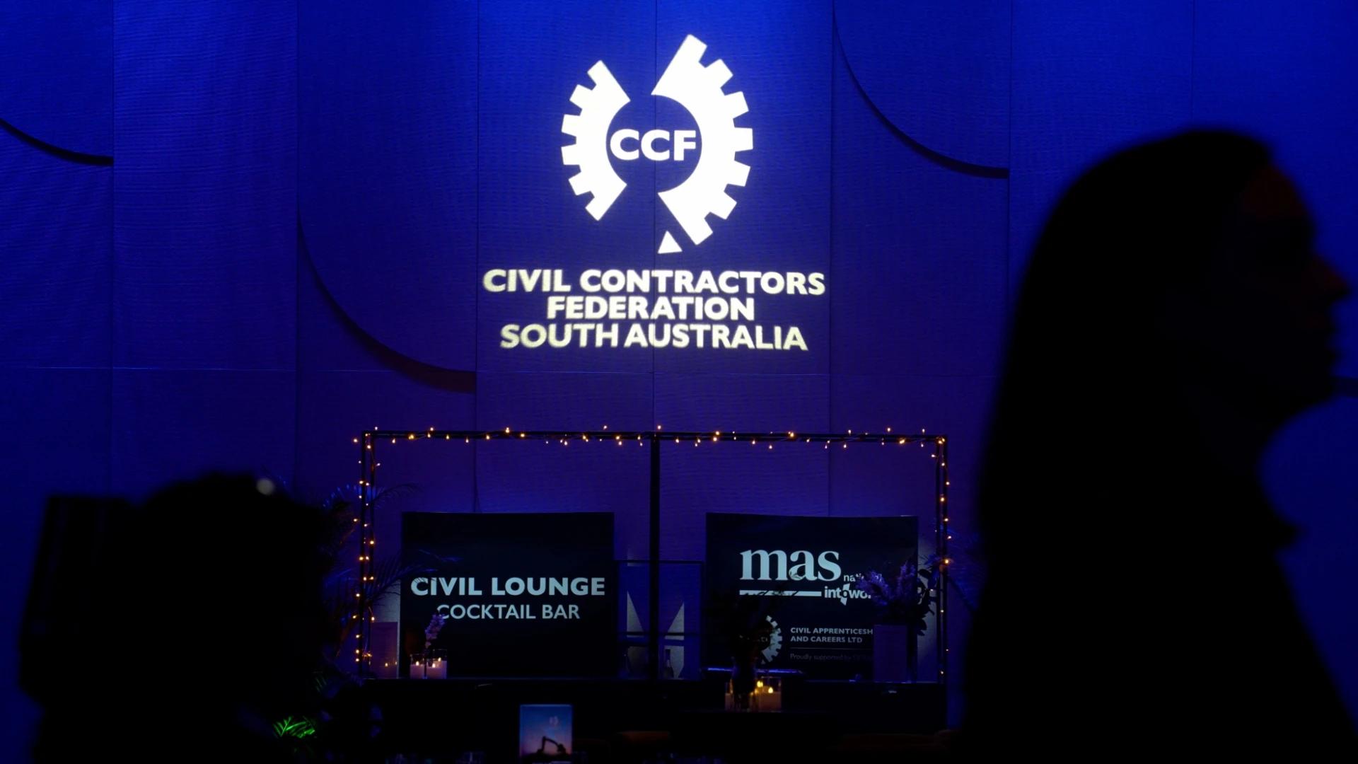 Close-up of illuminated Civil Lounge cocktail bar signage surrounded by event greenery - Encore APAC